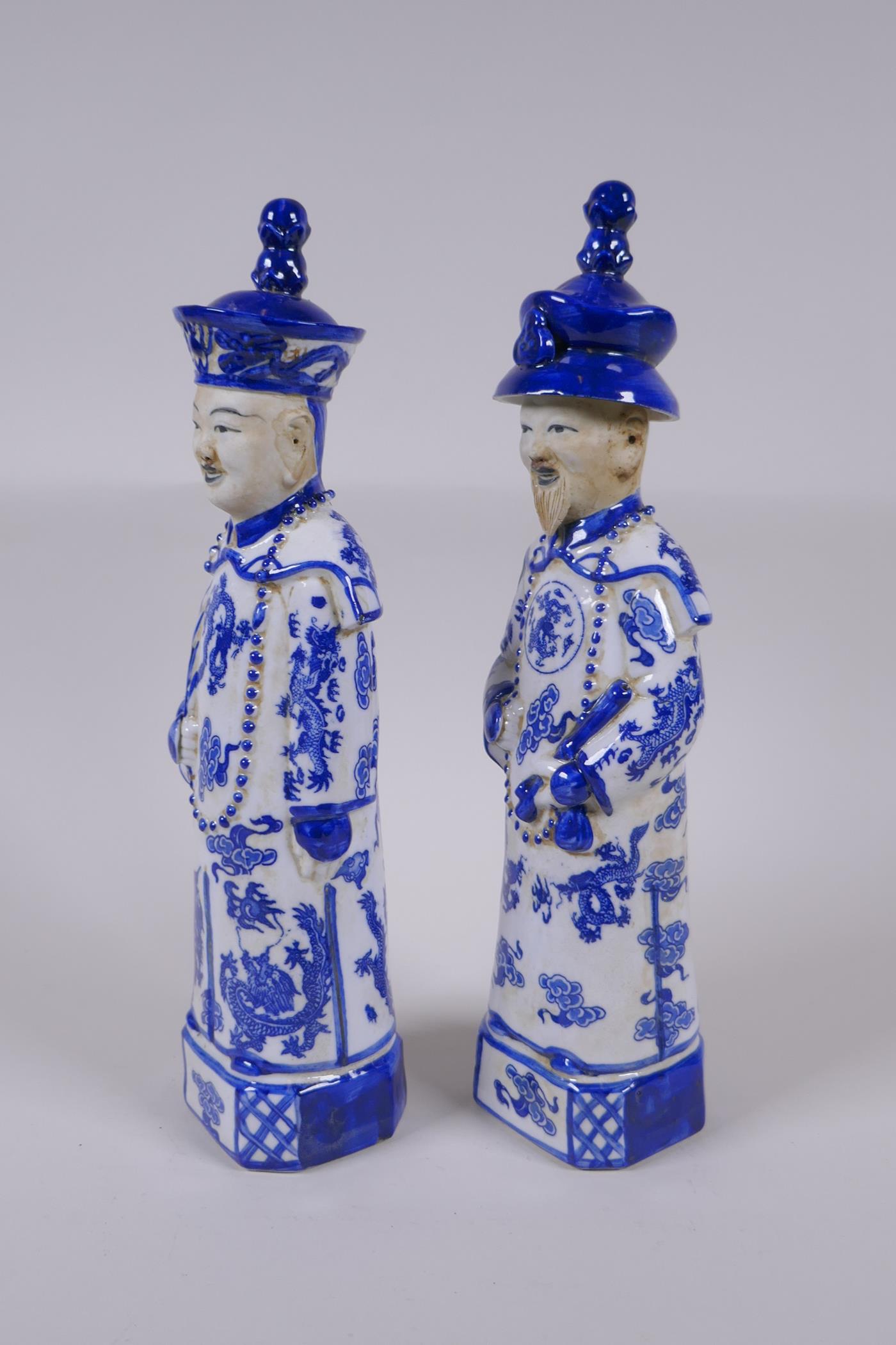A pair of Chinese Qing Dynasty blue and white porcelain figures, impressed marks to base, 29cm high - Image 4 of 6