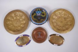A pair of Indo Persian gilt brass trays with chased and hammered decoration, an Egyptian silver
