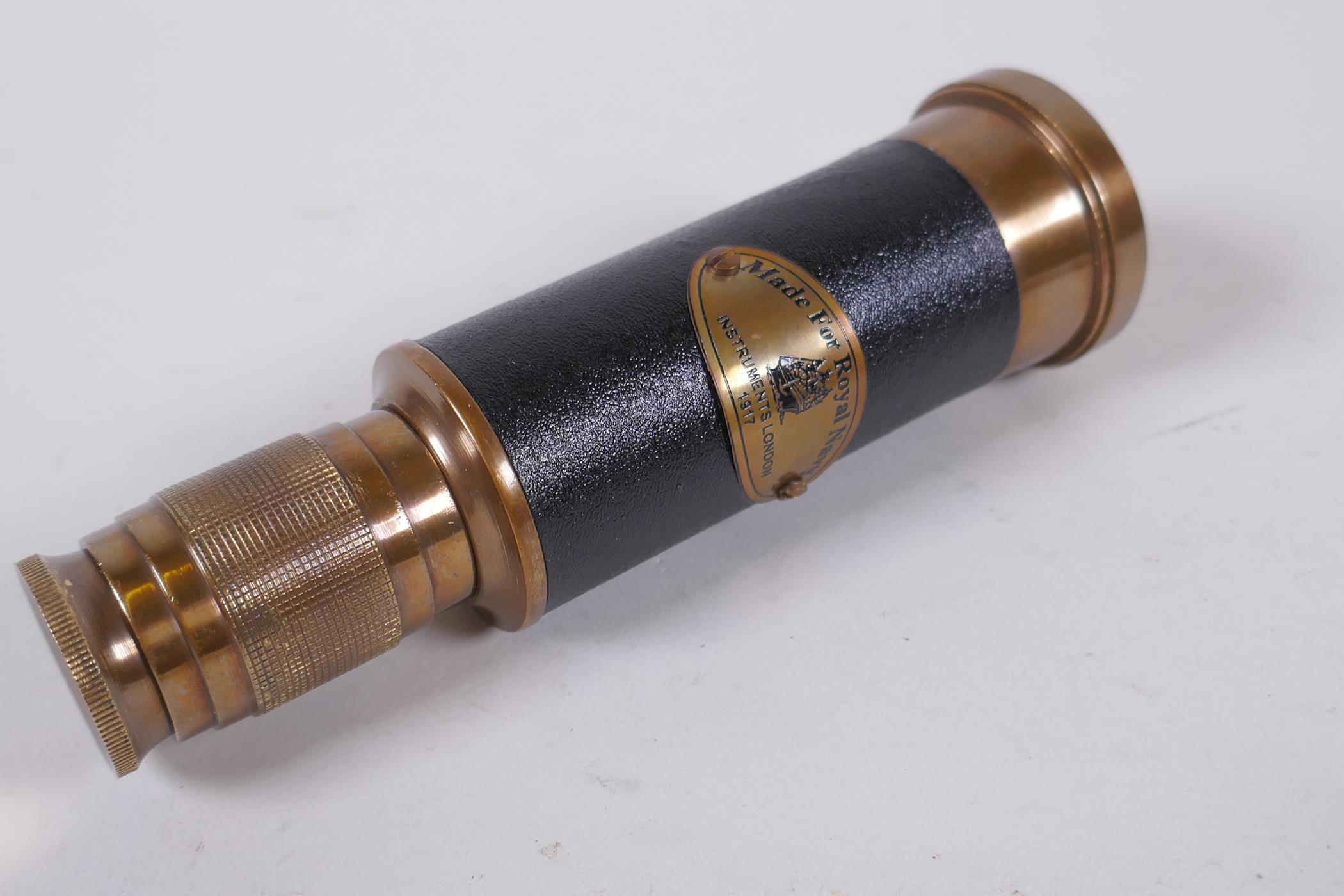 A reproduction brass sundial compass and a brass and leatherette miniature telescope, 13cm long - Image 3 of 3