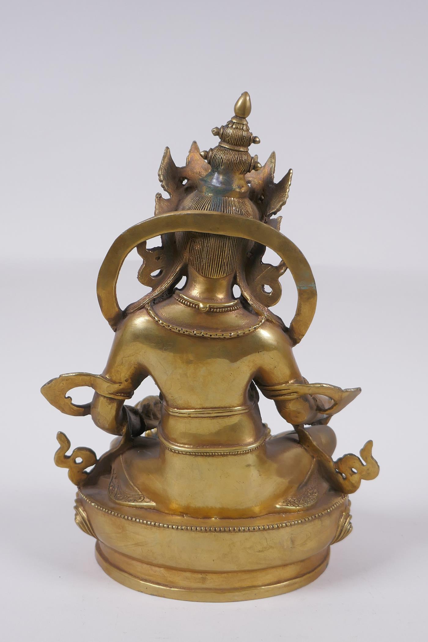 A Tibetan bronze figure of a wrathful deity, impressed double vajra mark to base, 29cm high - Image 4 of 7