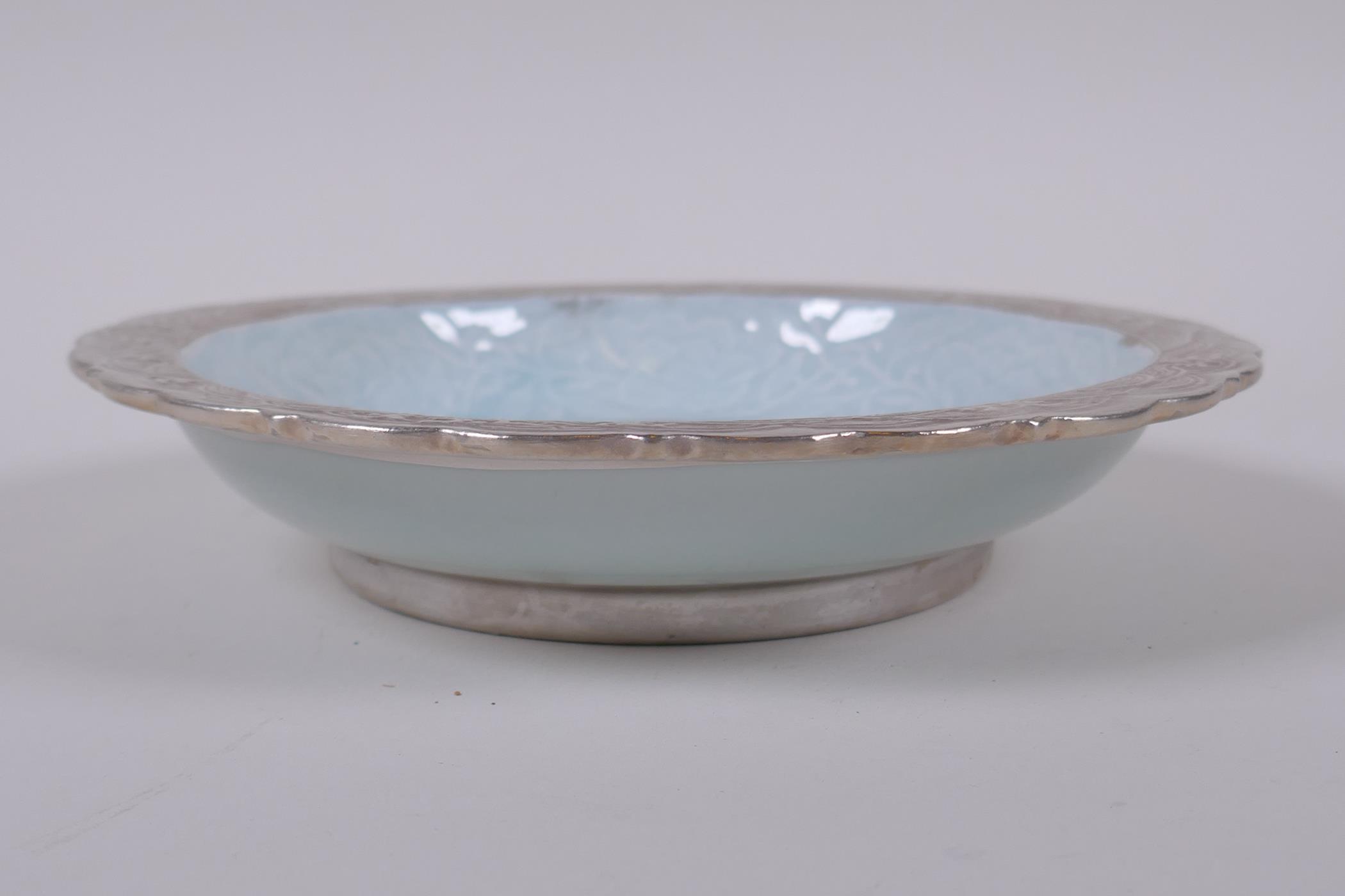 A celadon and silver ground dish with lobed rim and raised dragon decoration, Chinese Qianlong - Image 3 of 5