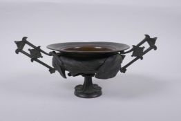 A C19th French bronze two handled urn with raised barley decoration, loose handles, 11cm high,