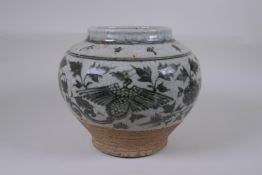 A Chinese blue and white crackleware pottery vase with phoenix and lotus flower decoration,