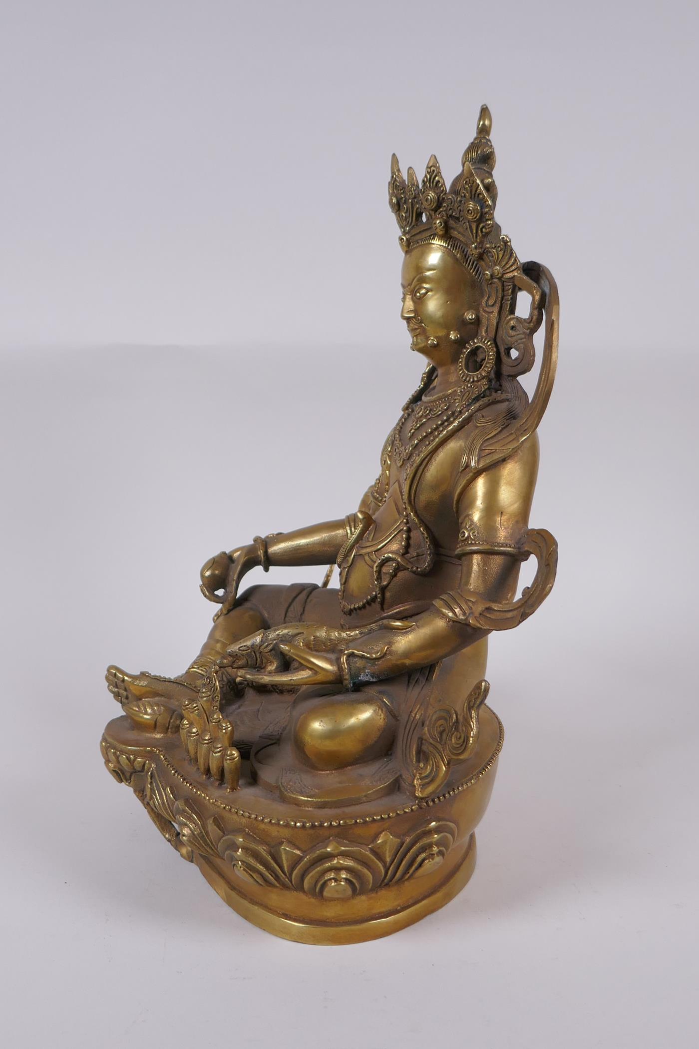 A Tibetan bronze figure of a wrathful deity, impressed double vajra mark to base, 29cm high - Image 5 of 7