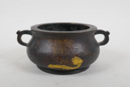 A Chinese bronze two handled censer with gilt ruyi and lotus flower decoration, Xuande 6 character