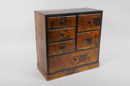 A Japanese Meiji Yosegi-Zaiku marquetry jewellery cabinet of six drawers, 30 x 14cm, 31cm high