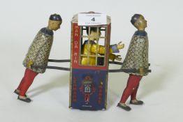 An antique Lehmann Marke tinplate clockwork Man-Da-Rin model of a Chinese sedan, 14cm high