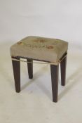 A Georgian mahogany stool with tapestry cover, 30 x 23cm, 36cm high