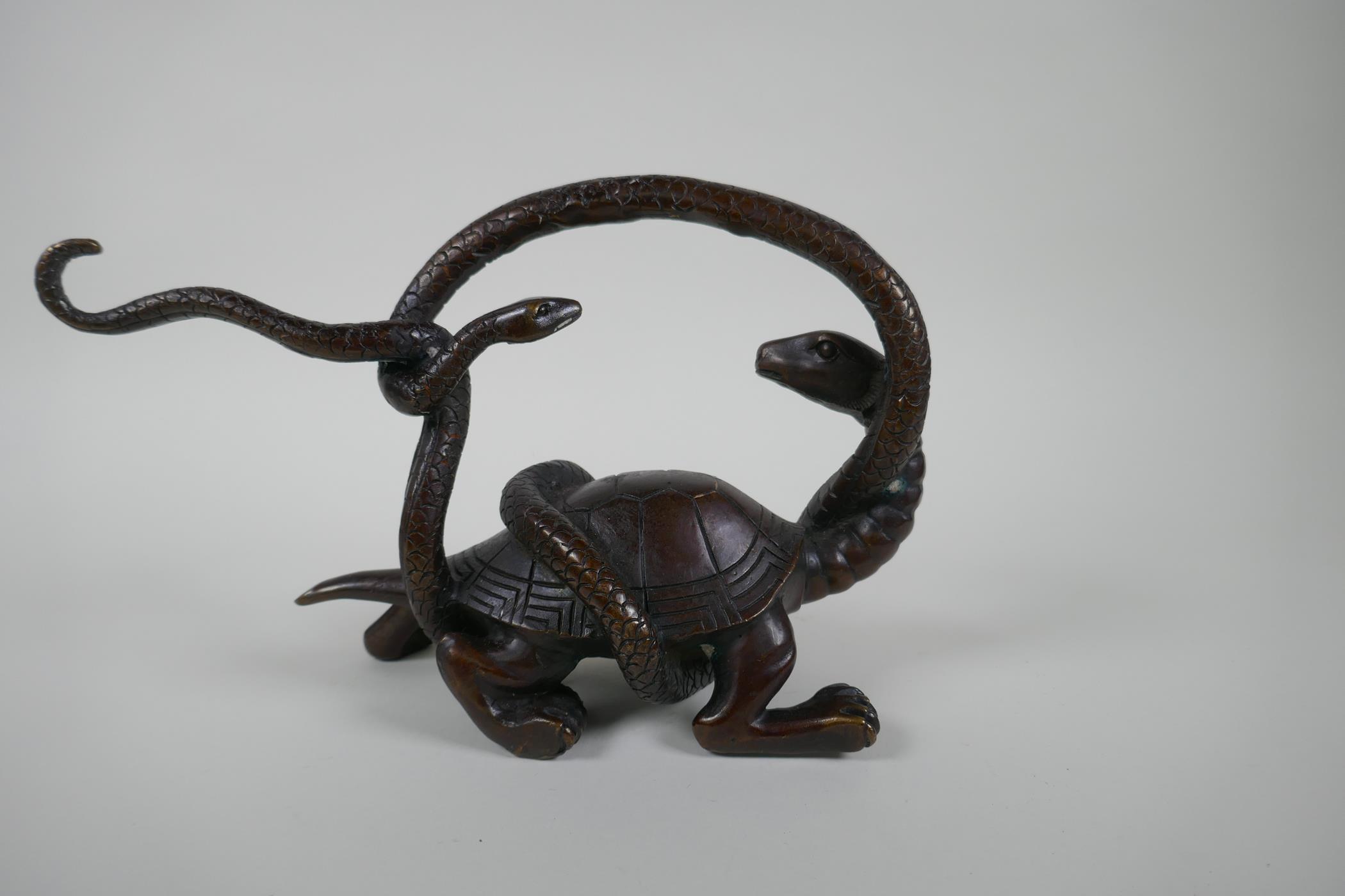 A Chinese filled bronzed metal tortoise entwined with a snake, 26cm long, 17cm high - Image 2 of 3