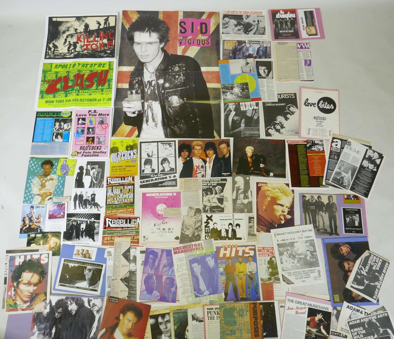 A quantity of punk ephemera to include press photos, flyers, zines, badges etc, including Buzzcocks,