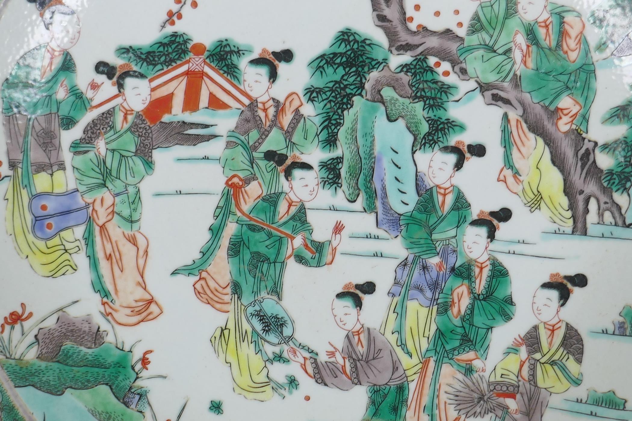 A Chinese KangXi style famille verte porcelain charger decorated with women in a landscape, vase - Image 2 of 5