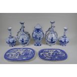 A pair of Delft Royal Bonn porcelain vases with two handles, together with two Delft slender