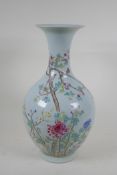 A Chinese famille rose porcelain vase decorated with birds amongst branches, KangXi 6 character mark