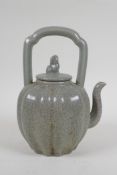 A Chinese celadon crackleware teapot in the form of a gourd, 22cm high