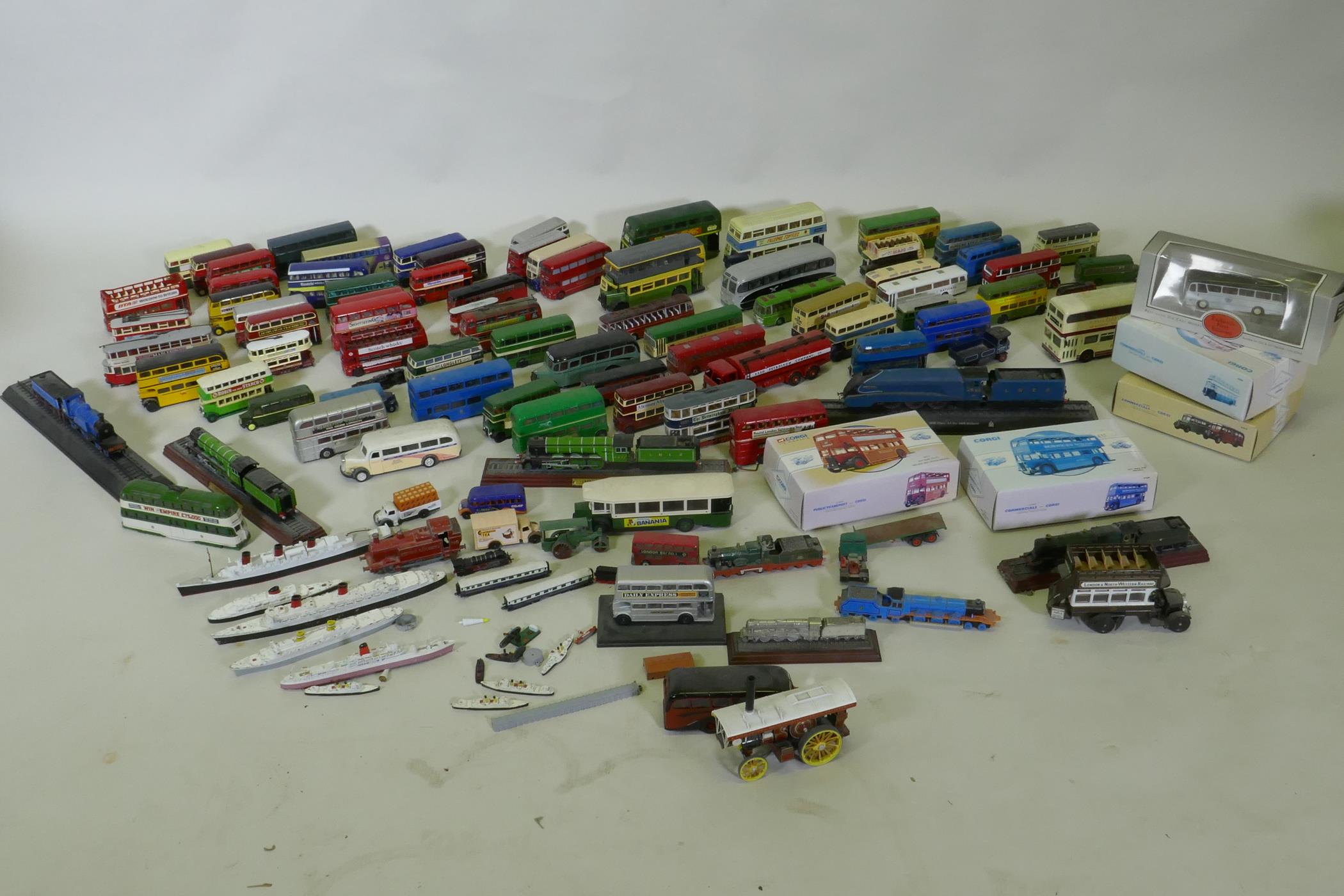 A quantity of collector's die cast model buses, trains, ships etc