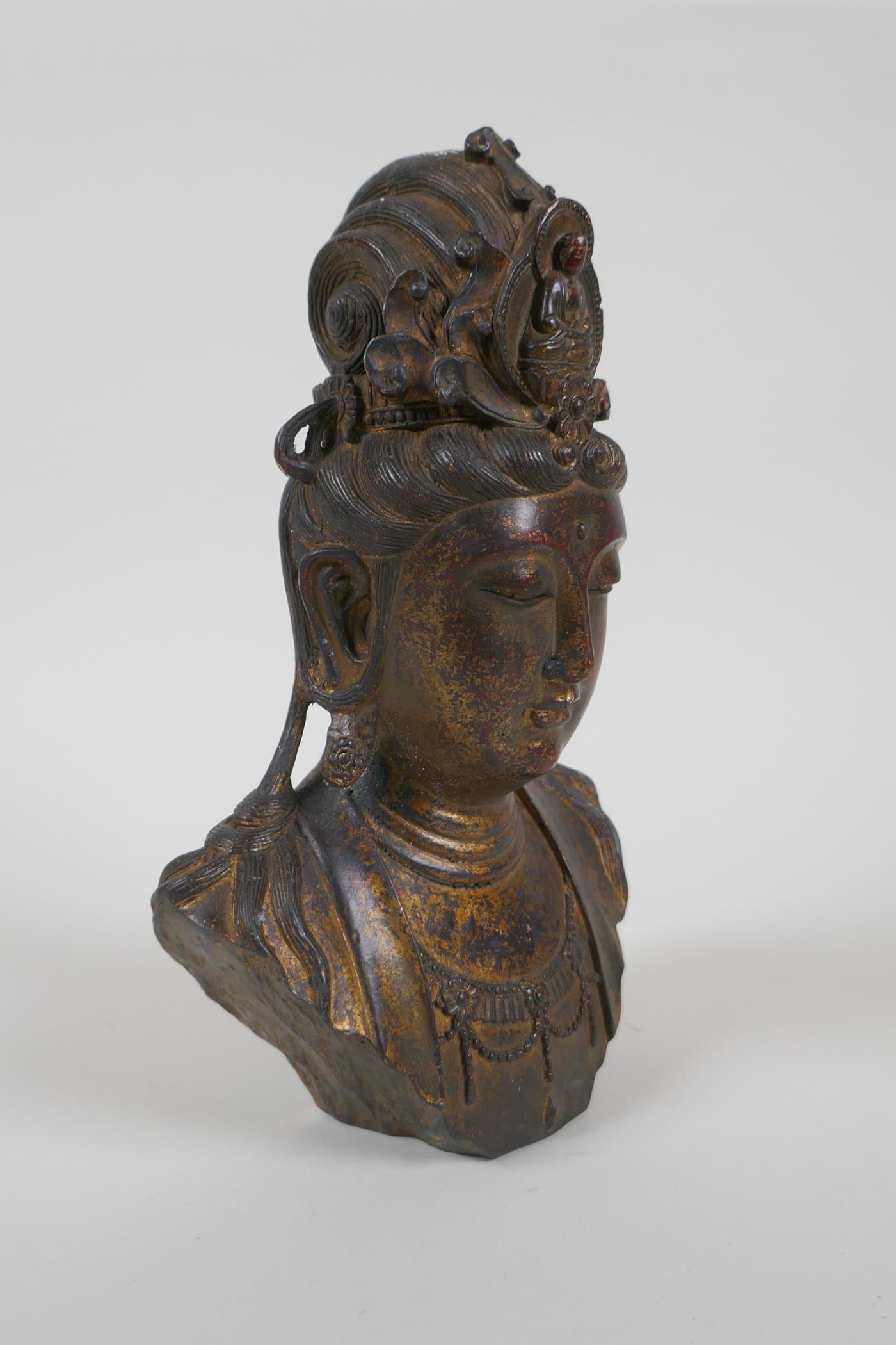 A Chinese filled gilt bronze bust of Quan Yin, 21cm high - Image 2 of 4