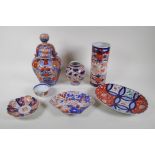 A quantity of Japanese Imari porcelain, to include a cylinder vase, ribbed jar and cover, vase,