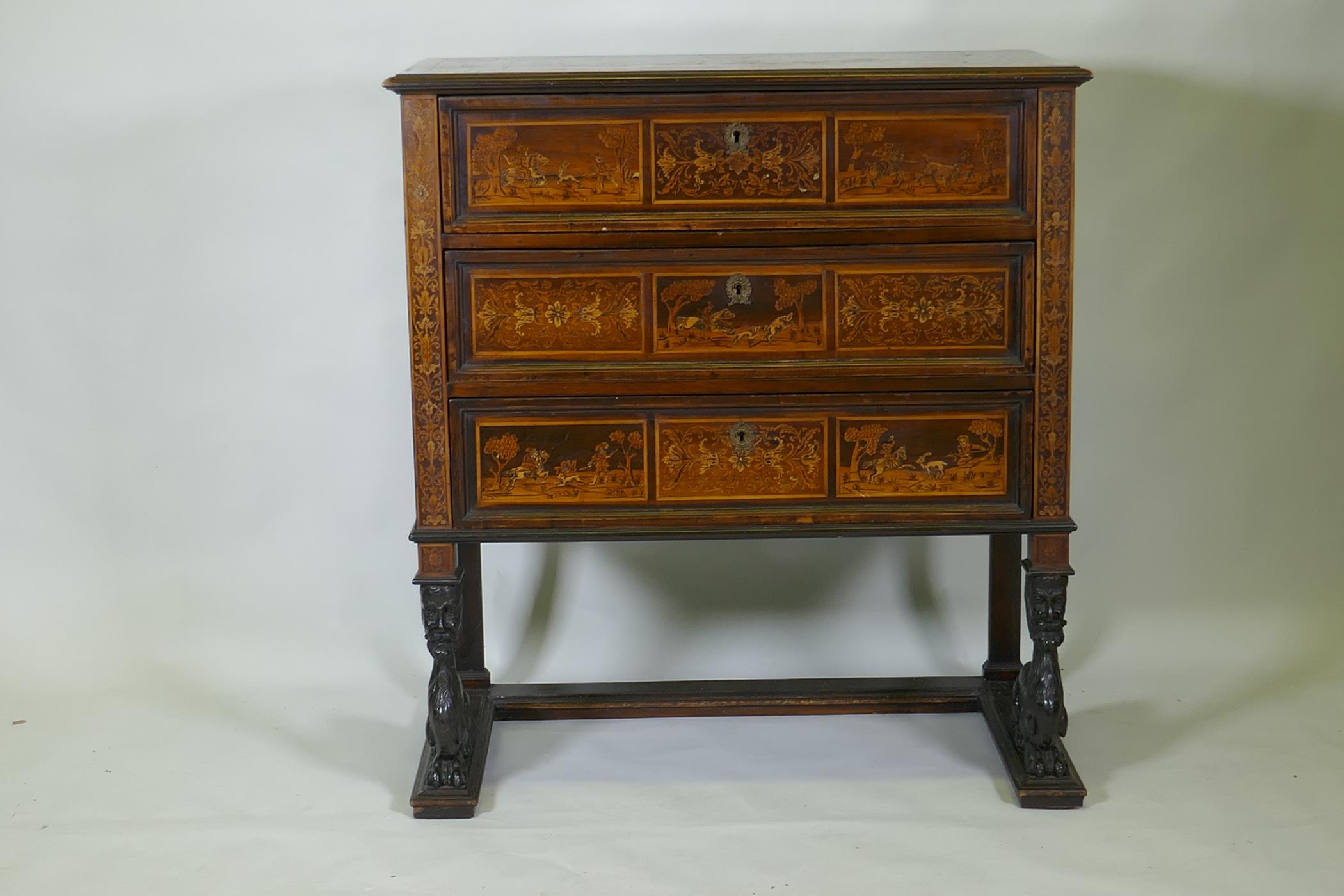 C18th/C19th Italian/Swiss marquetry inlaid walnut chest of three drawers, inlaid with hunting
