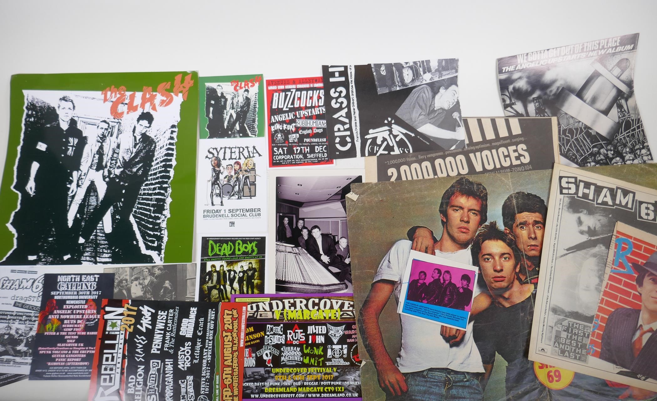 A quantity of punk ephemera to include shop display signs, stickers, flyers, press photos, newspaper