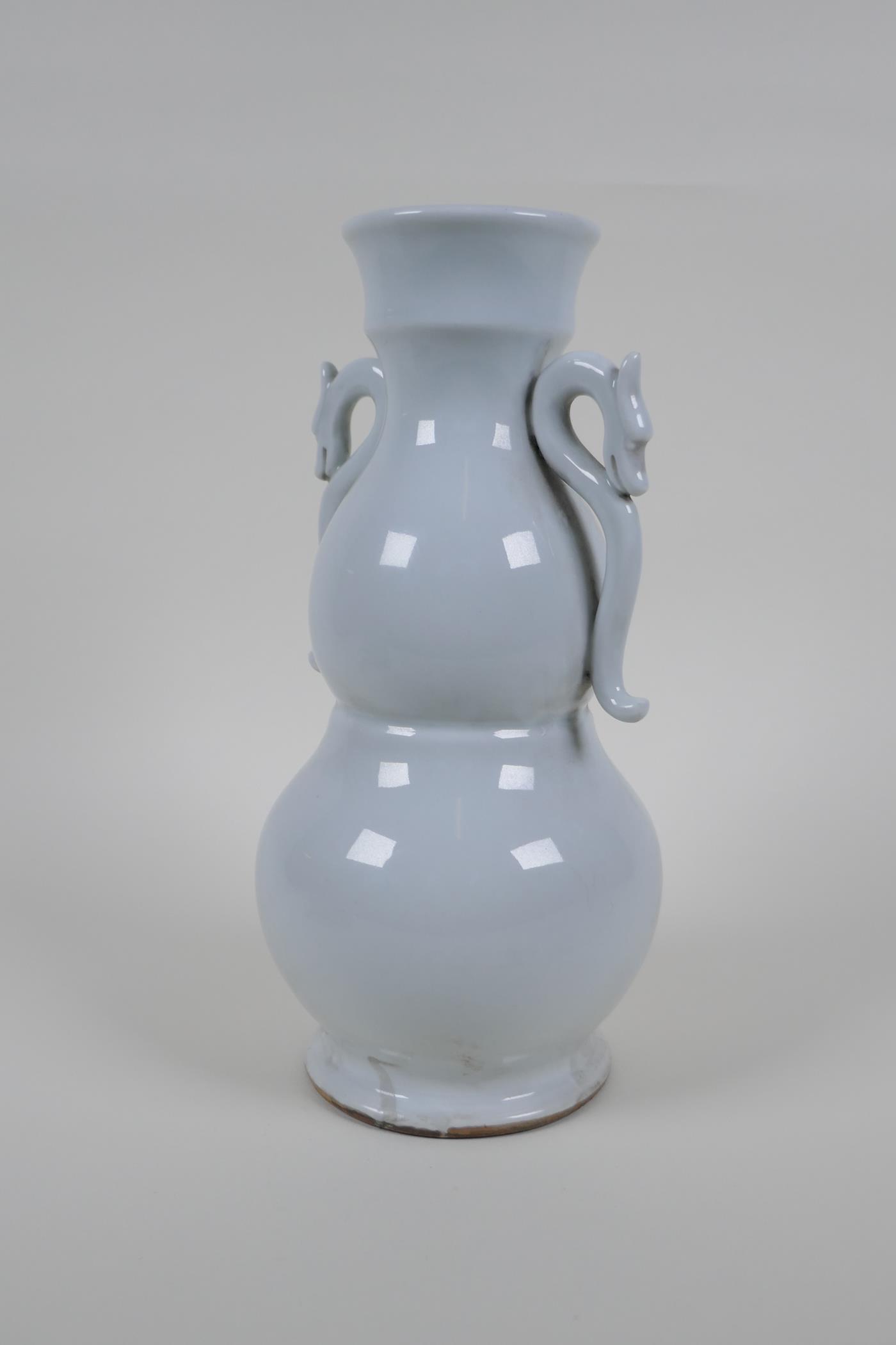A blanc de chine porcelain two handled double gourd vase with raised prunus blossom decoration, - Image 3 of 5