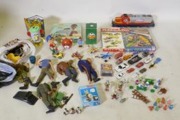 A quantity of vintage children's toys to include Asterix, Snow White and the Seven Dwarfs, Smurfs,
