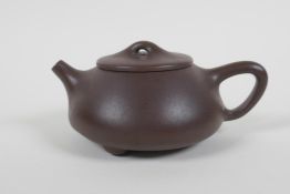 A Chinese YiXing teapot, impressed marks to base, 10cm diameter