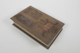 A Chinese wood and silk bound book containing white jade table pages with chased and gilt