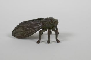 A Japanese style bronze okimono cicada, 5cm long