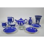 A collection of Antique Wedgwood Jasperware including a teapot, jugs, saucers, vases etc, AF, teapot