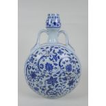 A blue and white moon flask with two handles and scrolling floral decoration, Chinese Xuande 6