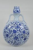 A blue and white moon flask with two handles and scrolling floral decoration, Chinese Xuande 6