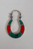 A decorative white metal pendant in the form of a horse shoe padlock, set with coral and malachite