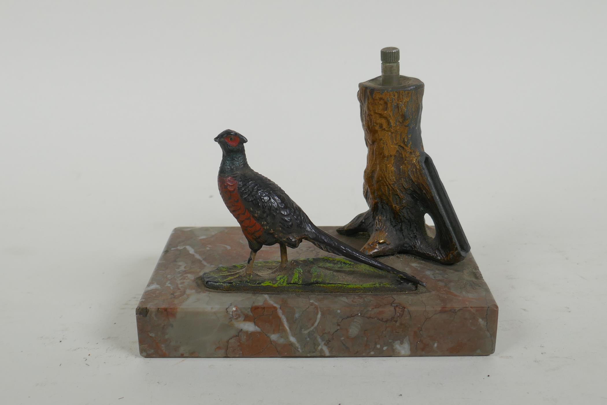 A cold painted bronze pheasant table lighter, 13cm long 10cm high