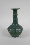 A Chinese moss green crackle glazed porcelain vase of octagonal form with chased and gilt
