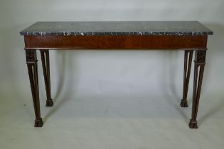 A mahogany Chippendale style serving table, with marble top and blind frieze, raised on pierced