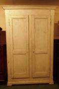 A C19th French painted pine 'knock down' armoire with two panelled doors, 150 x 59 x 224cm