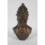 A Chinese filled gilt bronze bust of Quan Yin, 21cm high