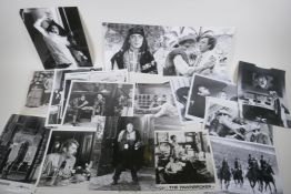 A quantity of movie press photographs to include Charlie Chaplin, Gene Wilder, Roy Kinnear,