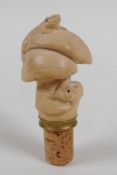 A carved boxwood bottle stopper in the form of mushrooms, toad and rat, 10cm