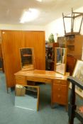A mid century Loughborough teak wardrobe (dismantles) and matching dressing table with triple