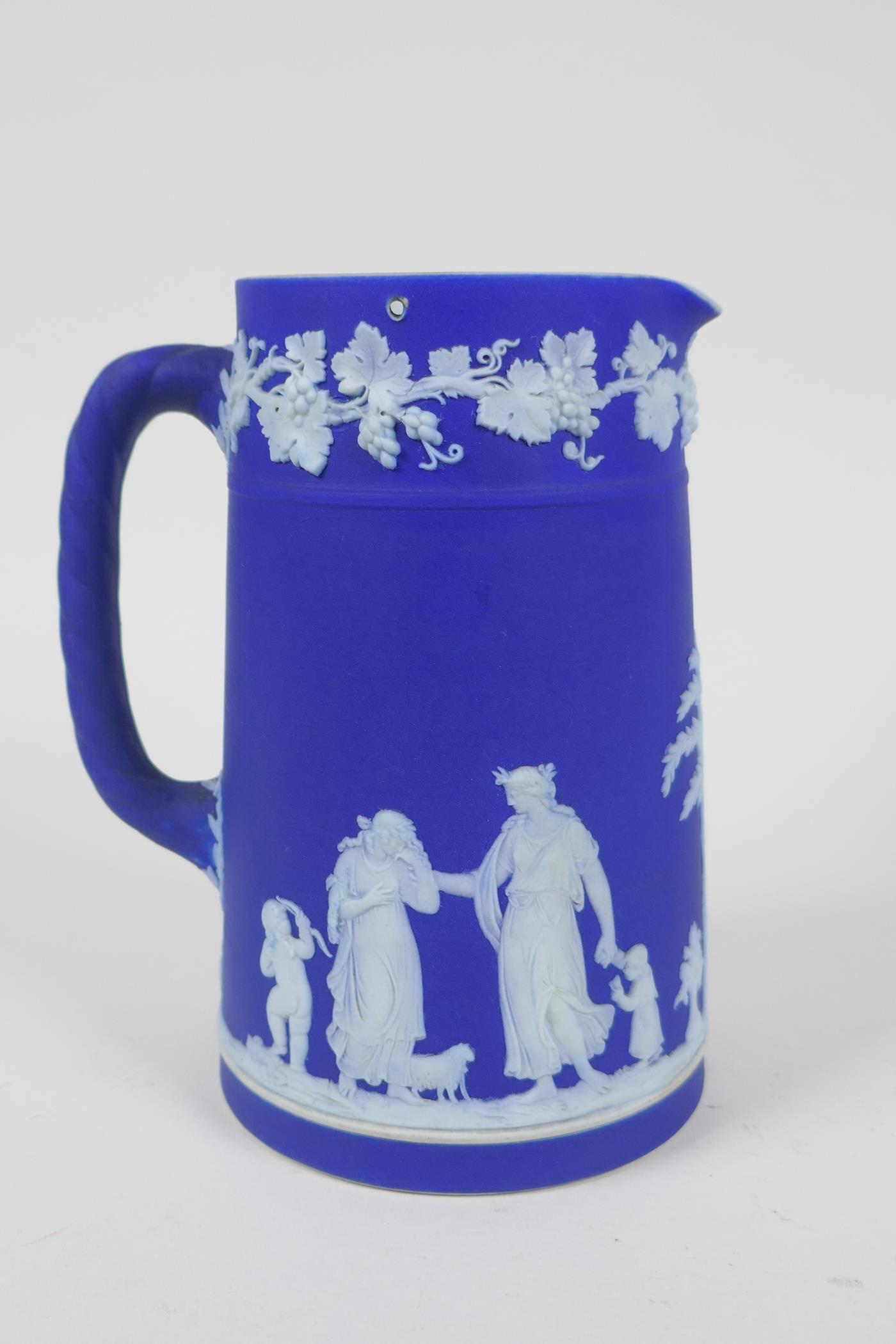 A collection of Antique Wedgwood Jasperware including a teapot, jugs, saucers, vases etc, AF, teapot - Image 6 of 8