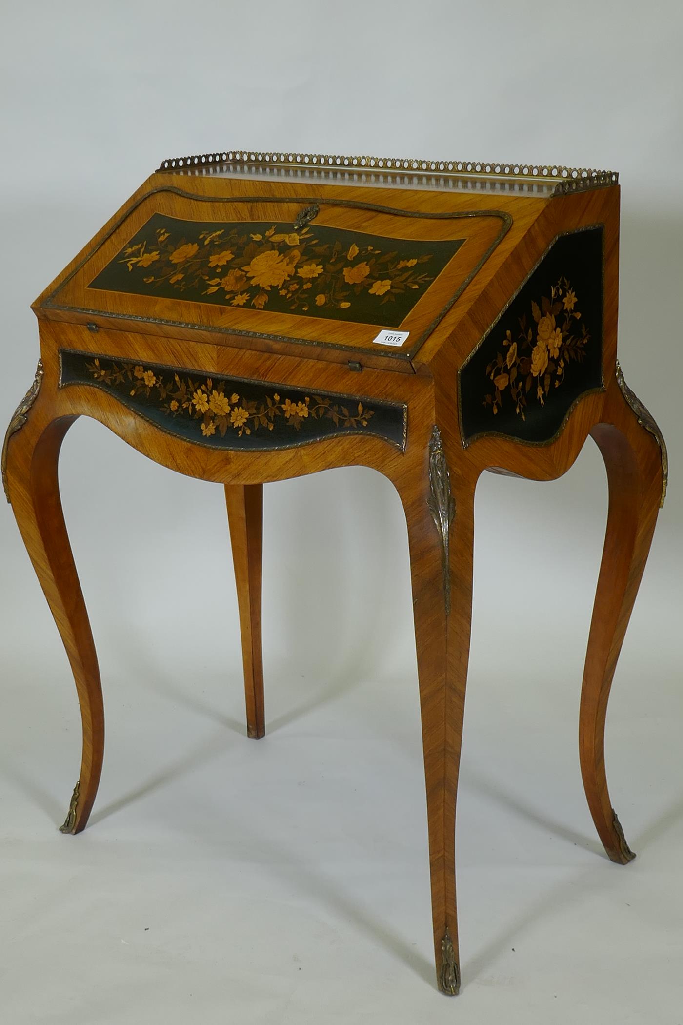 A French marquetry inlaid kingwood bureau-de-dame, with brass mounts, the fall front folding down to - Image 5 of 5