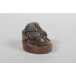 A Chinese carved soapstone seal with peach decoration, 4.5cm high