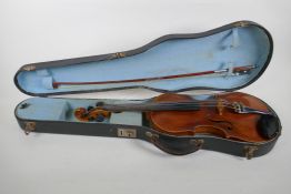 A vintage violin with single piece back, stamped Stainer to the back, together with a bow and