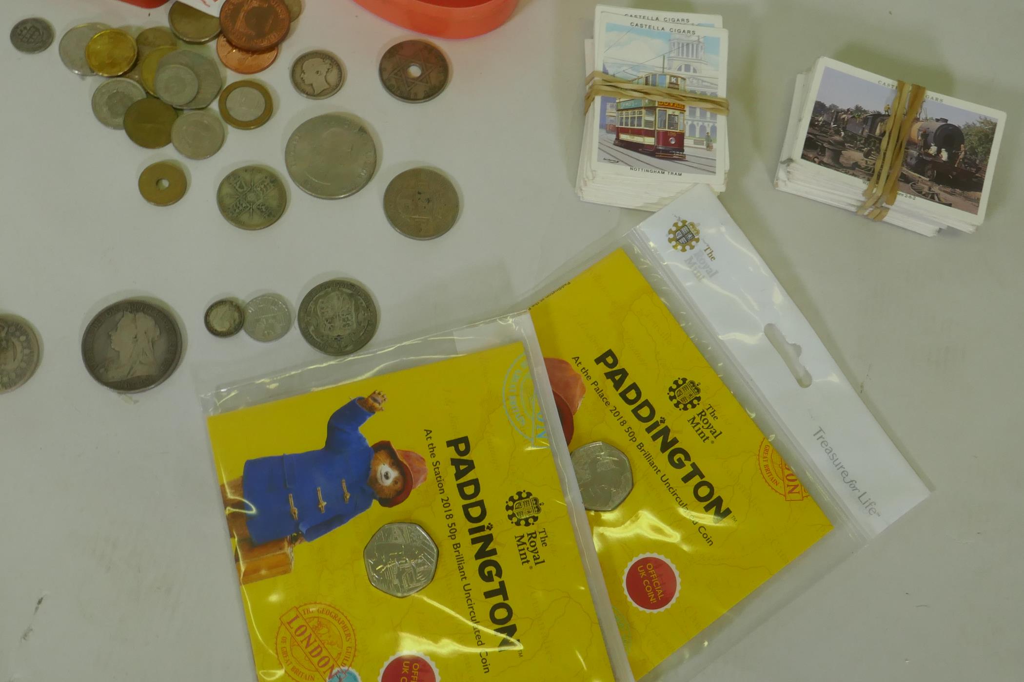 A quantity of UK and world coins, costume jewellery, stamps, cigarette cards, watches, Omega stop - Image 2 of 6