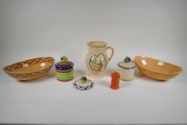 Six assorted pieces of Ashtead Pottery to include a jug, (J16), two sugar pots and covers, (X13),