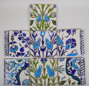 Seven Iznik pottery wall tiles decorated with a foliate design, 15.5 x 15.5cm