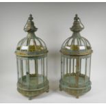 A pair of domed topped metal lanterns with distressed gilt and ver de gris patina, 60cm high