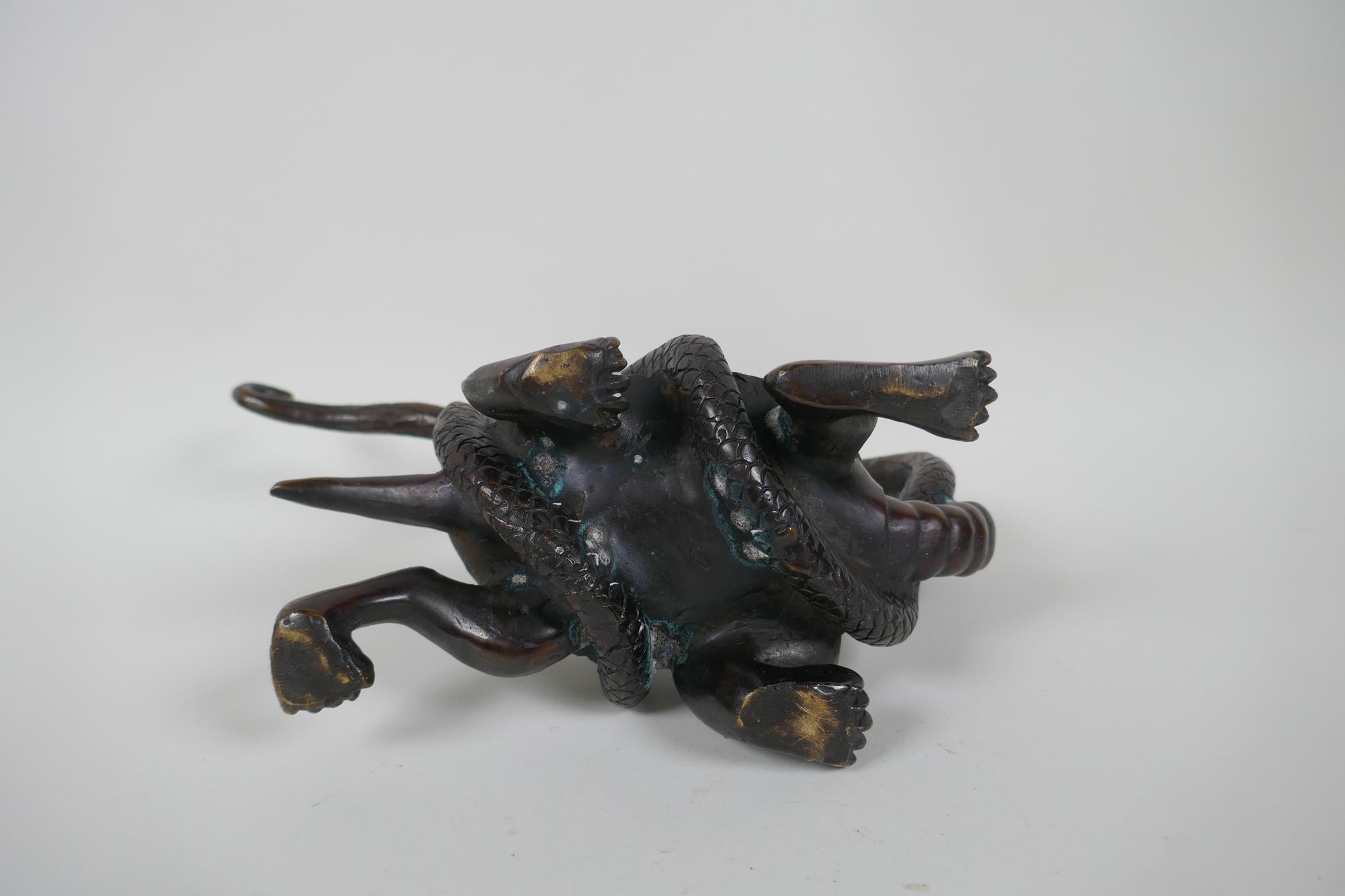 A Chinese filled bronzed metal tortoise entwined with a snake, 26cm long, 17cm high - Image 3 of 3