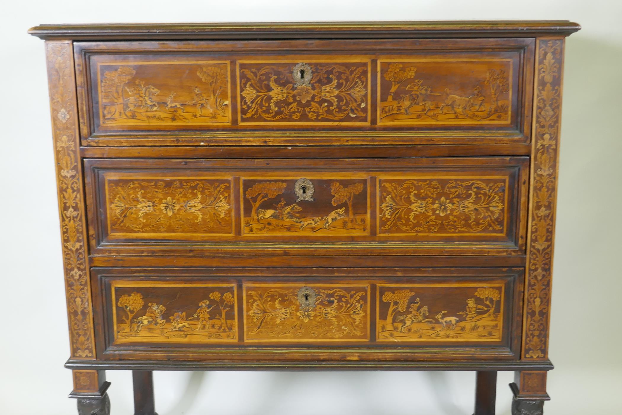 C18th/C19th Italian/Swiss marquetry inlaid walnut chest of three drawers, inlaid with hunting - Image 2 of 10